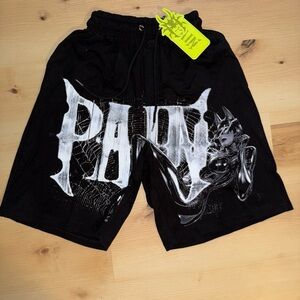 Black Shorts with Neon Green Tag